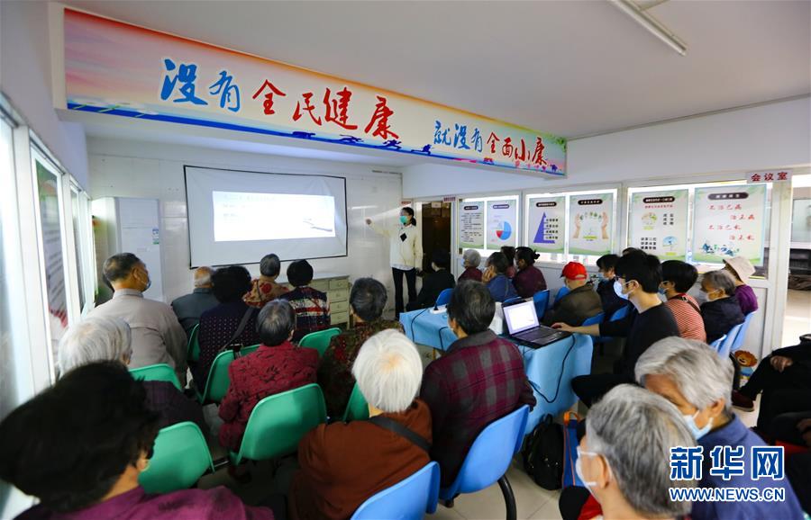 （新華全媒頭條·兩會精神看落實·圖文互動）（3）整體謀劃、系統(tǒng)升級、全面提升——落實全國兩會精神織牢織密公共衛(wèi)生防護網(wǎng)