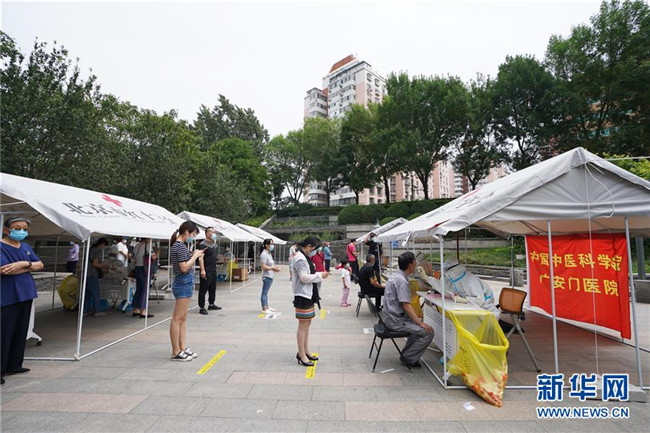 （新華全媒頭條·圖文互動）（5）首都再戰(zhàn)“疫”，難忘40天——寫在北京應急響應級別降級之際 